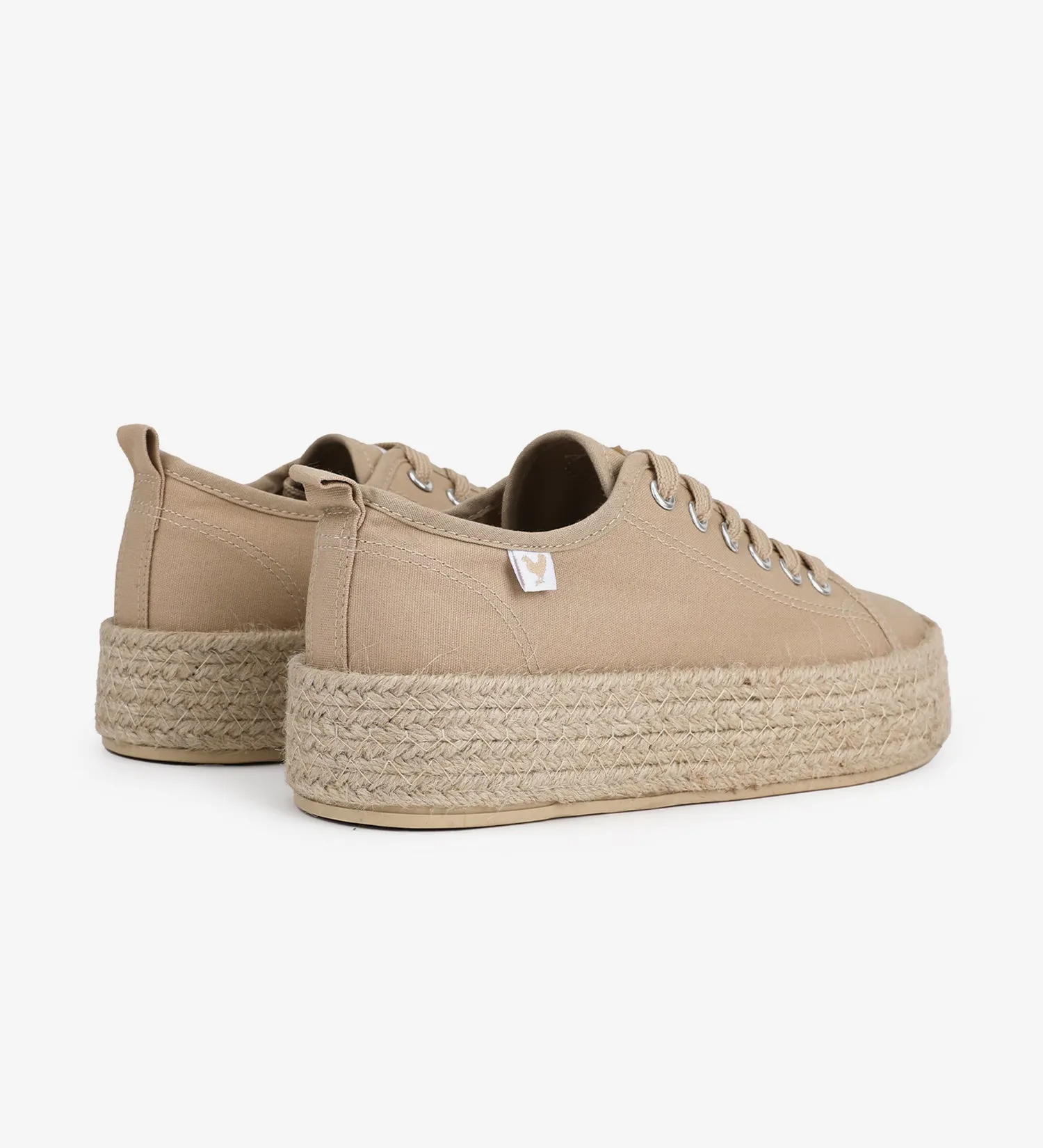 Espadrille sneakers with a 4cm platform and laces.