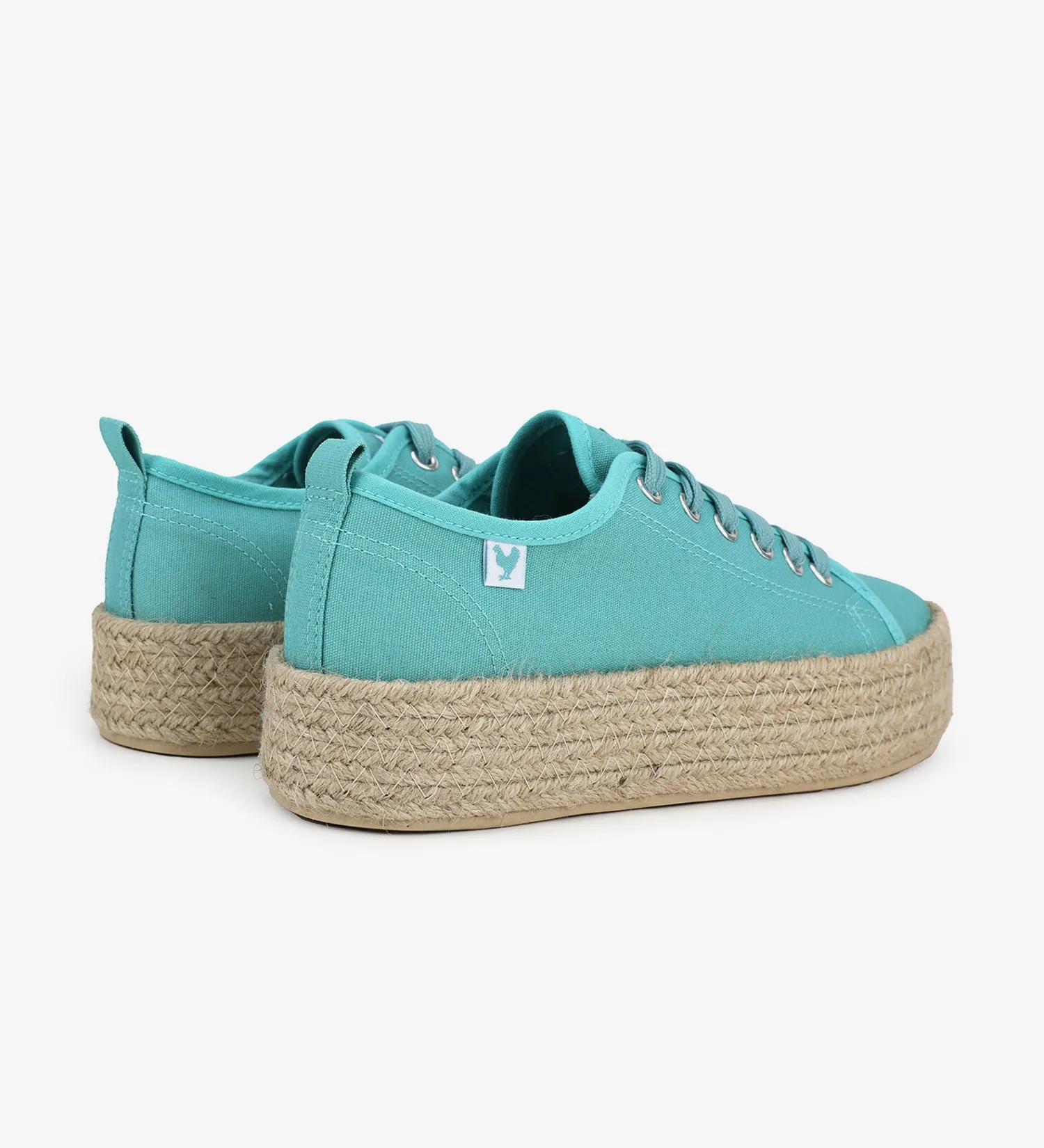 Espadrille sneakers with a 4cm platform and laces.