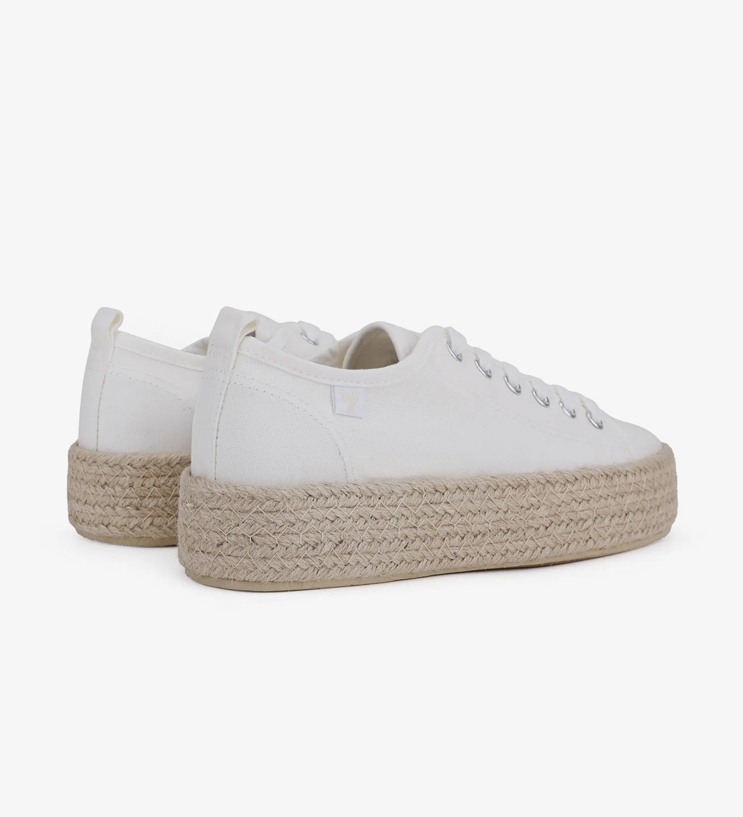 Espadrille sneakers with a 4cm platform and laces.