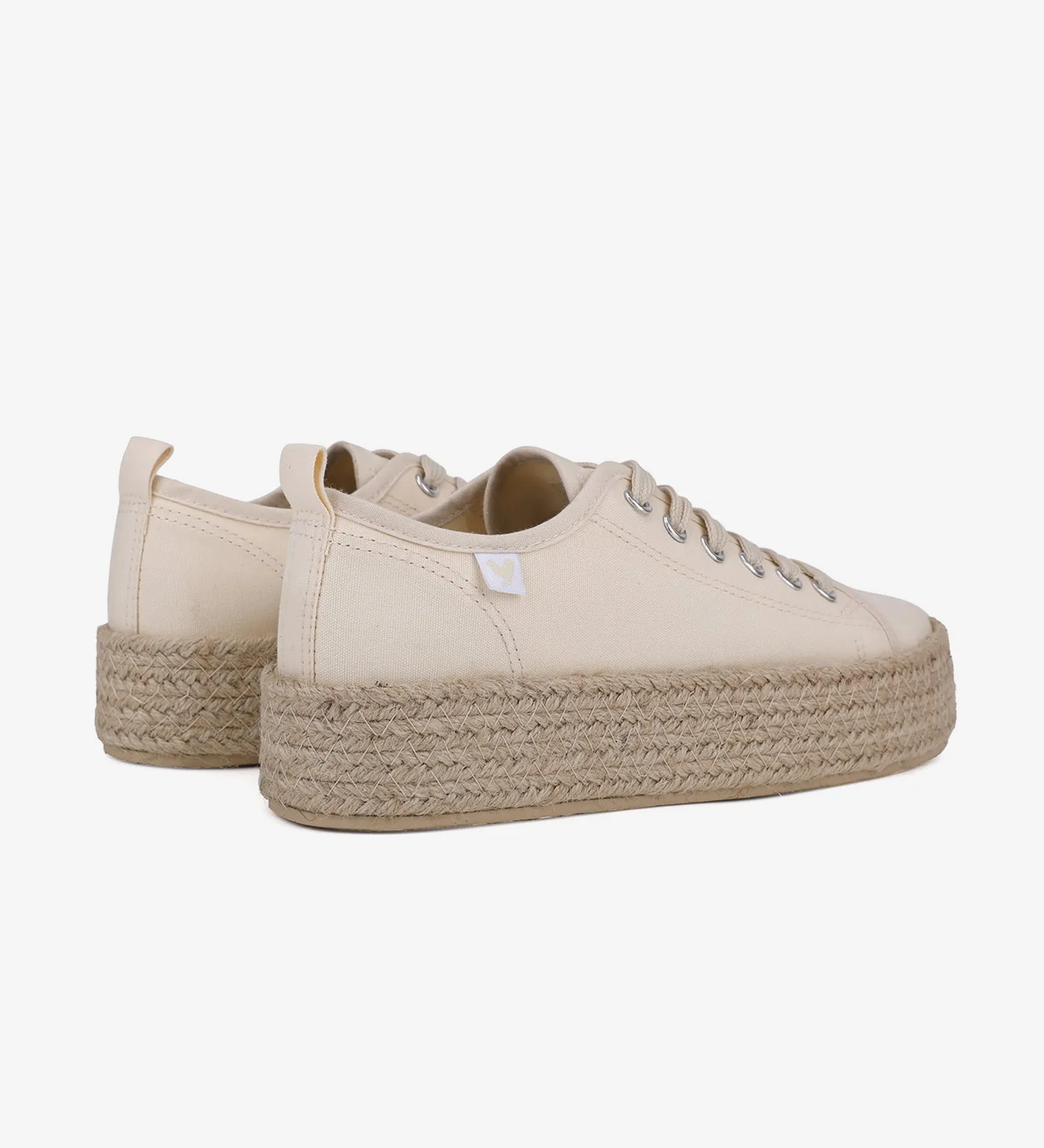 Espadrille sneakers with a 4cm platform and laces.