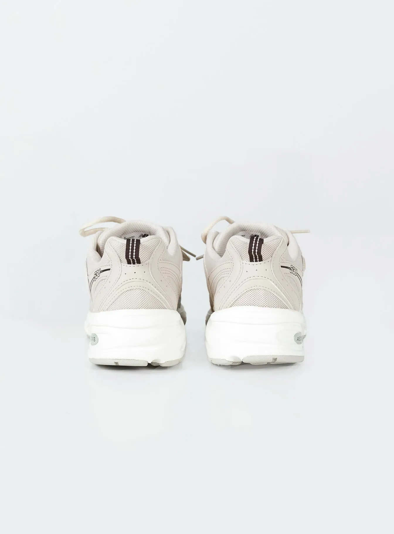 New Balance 530 Taupe: Google SEO Result - Shop the trendy New Balance 530 Taupe sneakers now!