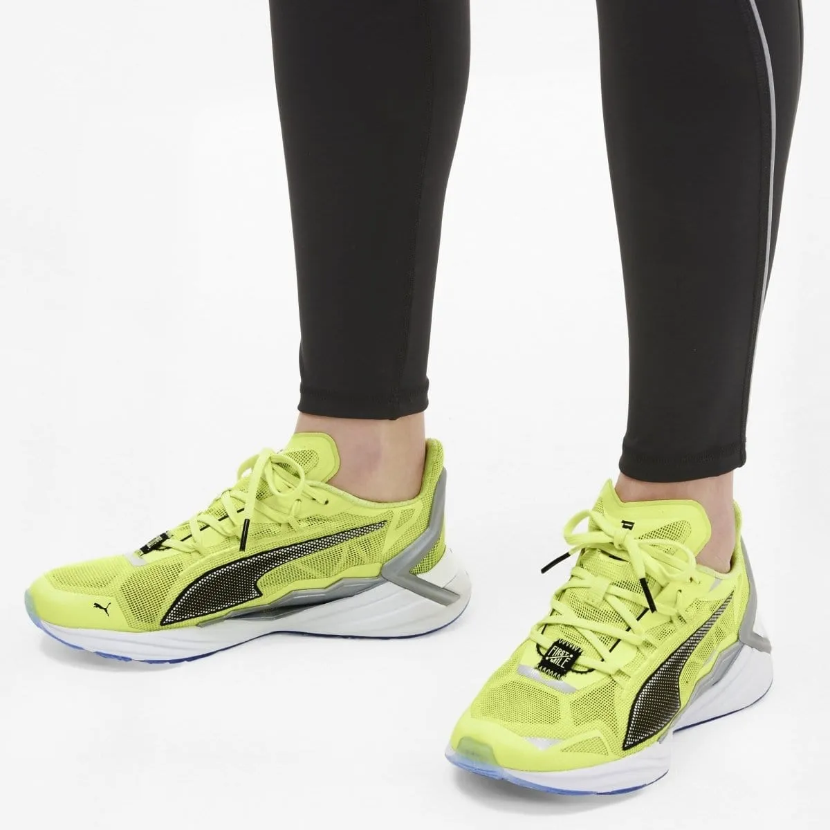 Puma running shoe in ultraride xtreme yellow for women's first mile.